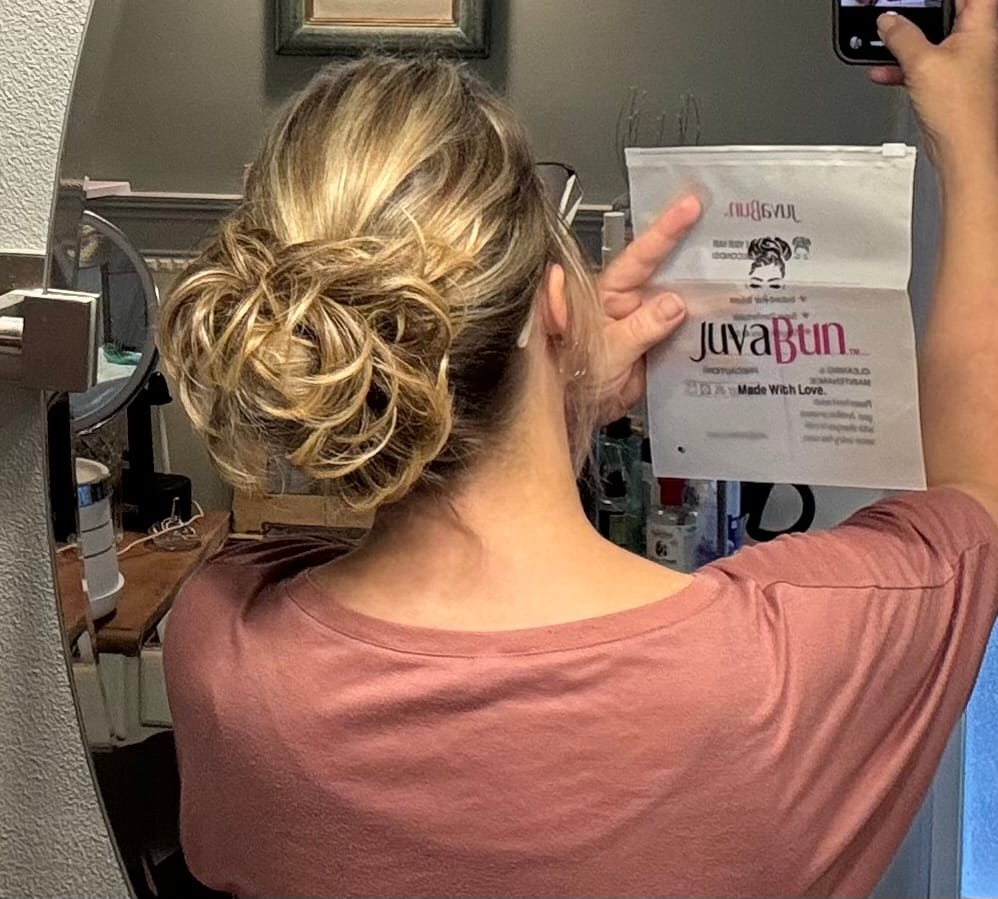 A JuvaBun customer wearing the Small Messy Bun