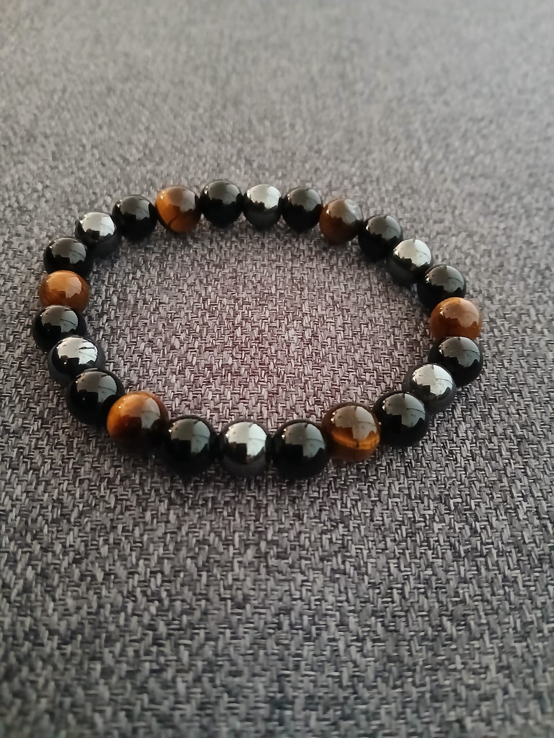 Customer photo review of Bracelet "Triple Protection" en Hématite, Oeil de Tigre et Obsidienne
