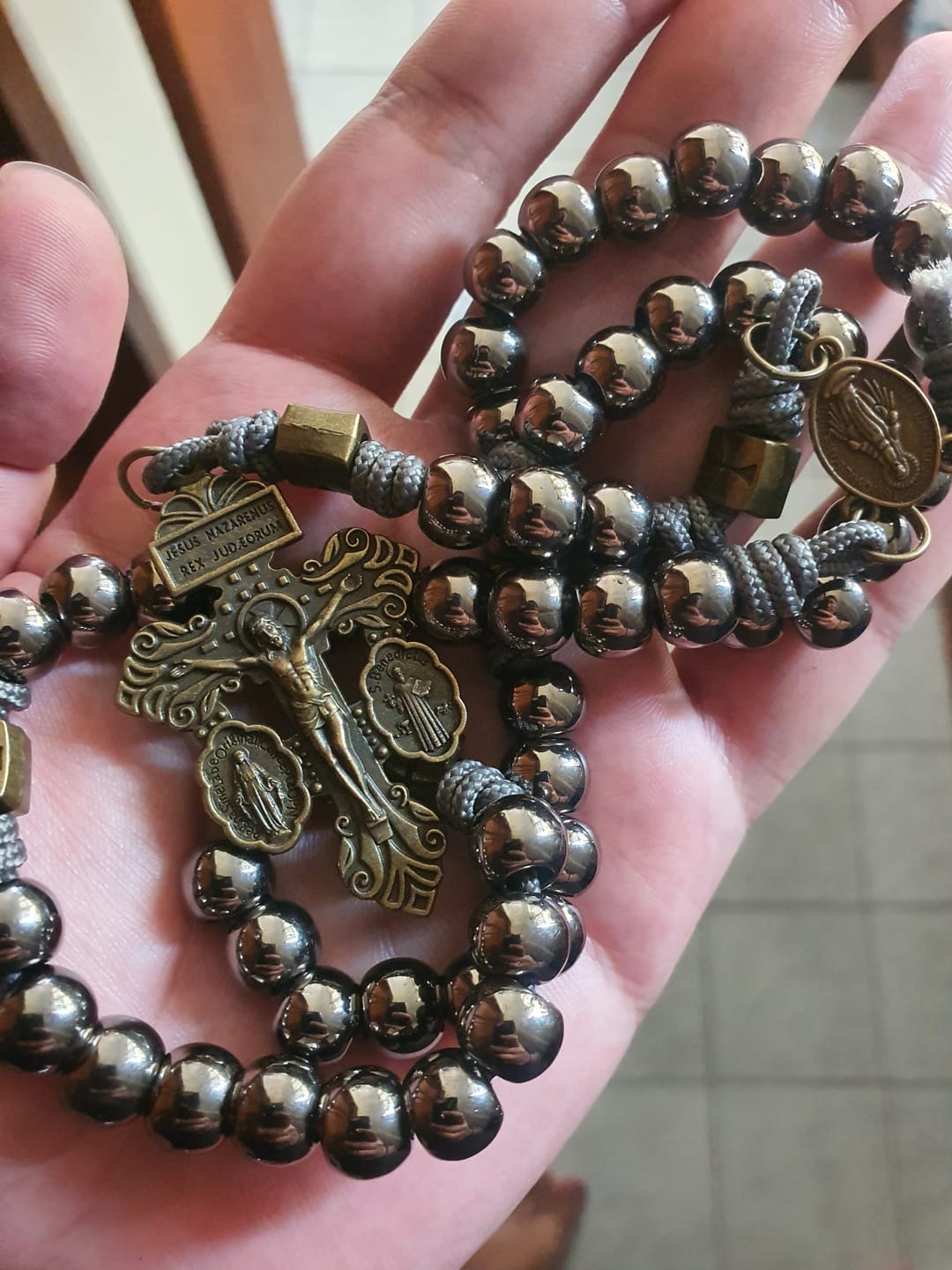 Customer photo review of FREE Today: Miraculous Medal & Crucifix of 8 mm Round Silver Black Gallstone Nylon Cord Rosary
