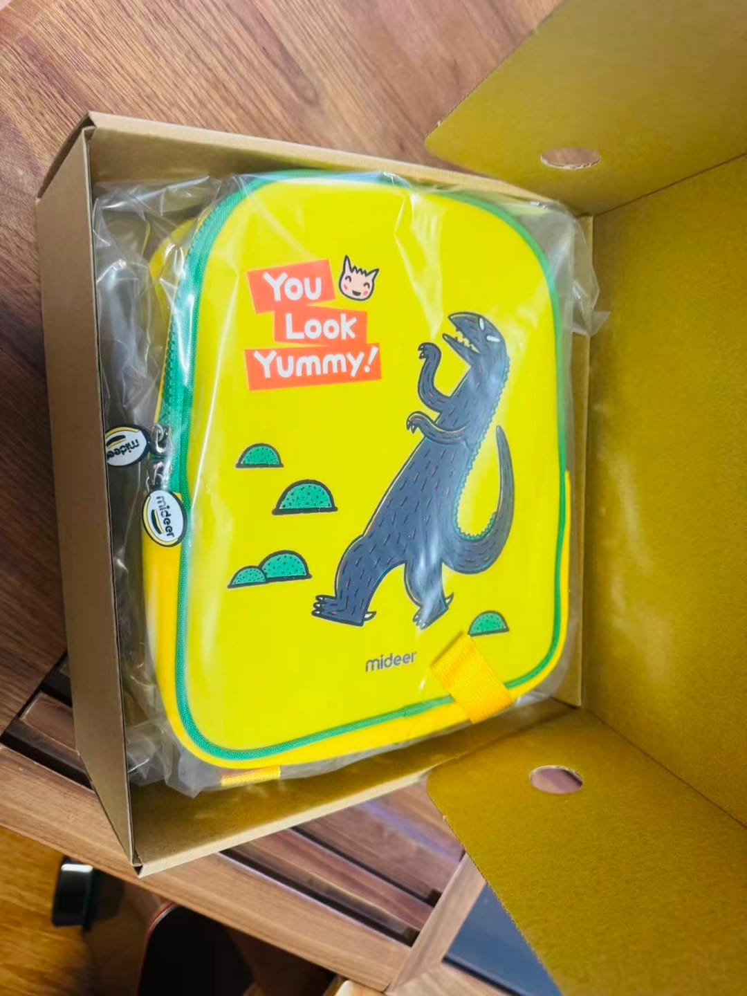 Customer photo review of Mideer You Look Yummy Kid Backpack: T-Rex