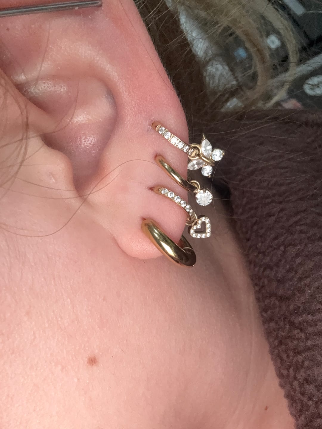 Customer photo review of My Huggies Hoop Earrings