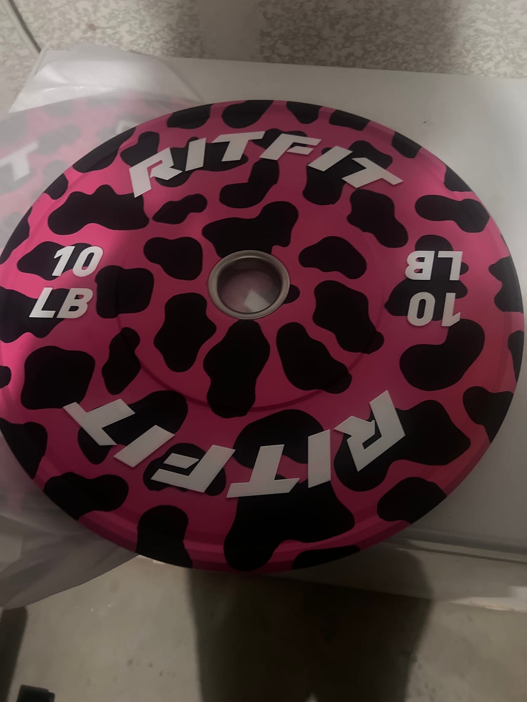 Customer photo review of RitFit Pink leopard print bumper plates Olympic 2-Inch Rubber