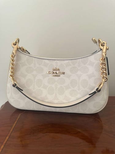 Customer photo review of Coach Women's Teri Shoulder Bag In Signature Canvas Gold/Walnut/Black