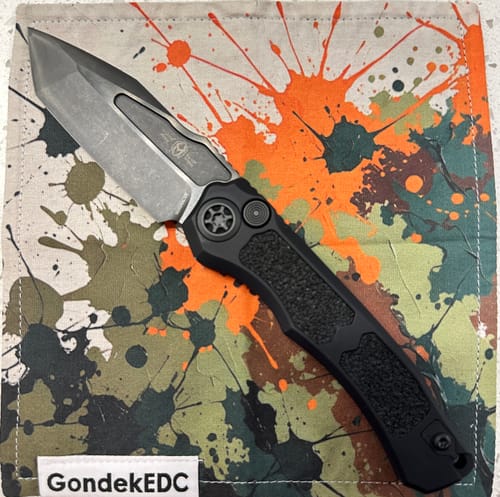 Tripp H. review of Heretic Wraith V4 Tanto Knife – Black Tactical Aluminum Chassis, DLC MagnaCut Blade, Side-Opening Automatic – Made in USA (H100-6A-T) image 1 out of 1