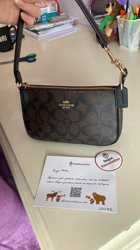 Customer photo review of Coach Women's Nolita 19 In Signature Canvas Gold/Brown Black