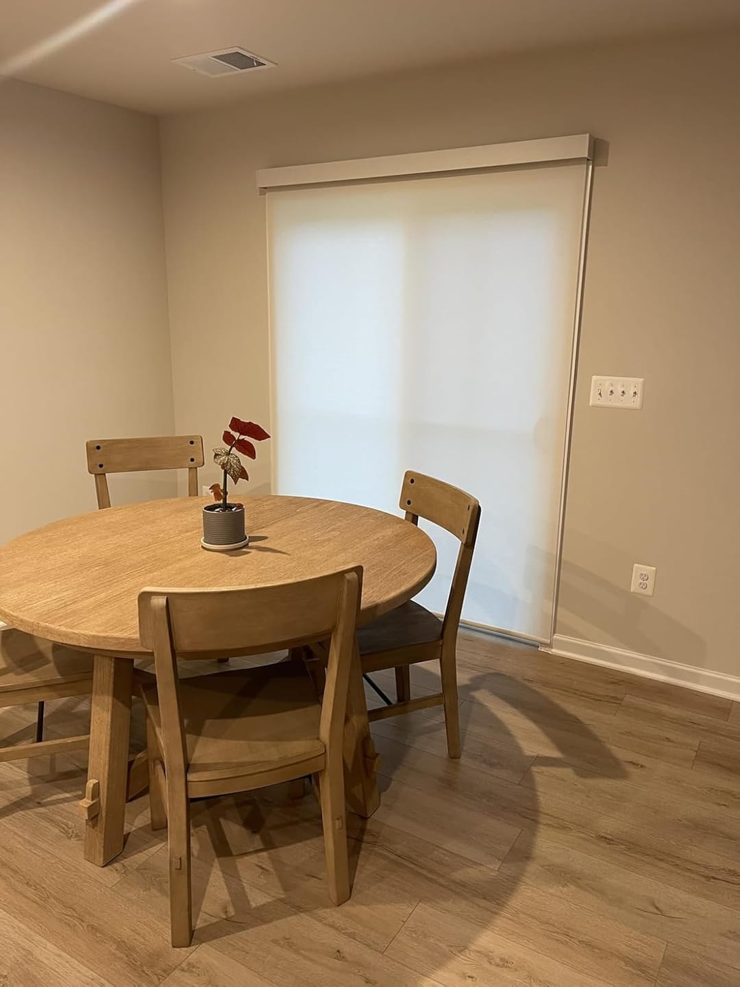 Customer photo review of Bringnox Motorized Light Filtering Roller Shades 70% Blackout Essential