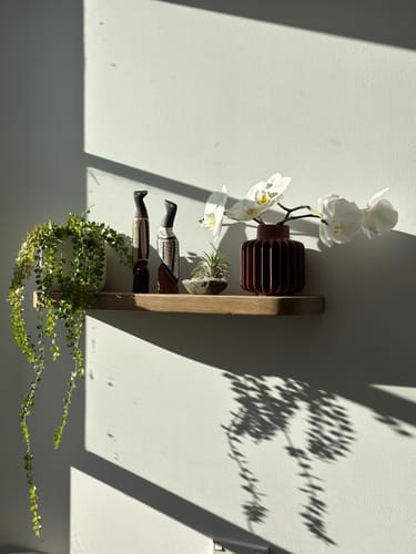 Customer photo review of Curved Floating Shelf