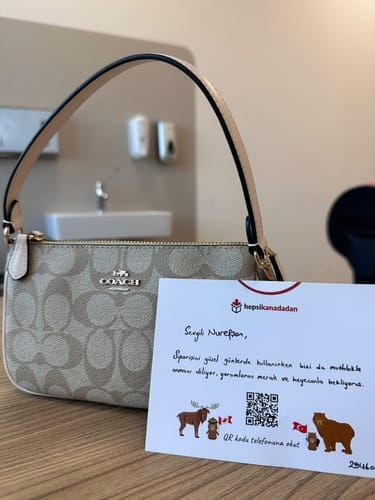 Customer photo review of Coach Women's Nolita 19 In Signature Canvas Gold/Light Khaki Chalk
