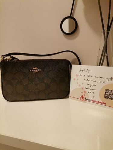 Customer photo review of Coach Women's Nolita 19 In Signature Canvas Gold/Brown Black