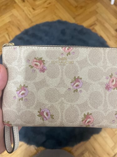 Customer photo review of Coach Women's Corner Zip Wristlet In Signature Canvas With Floral Print Gold/Sand Multi