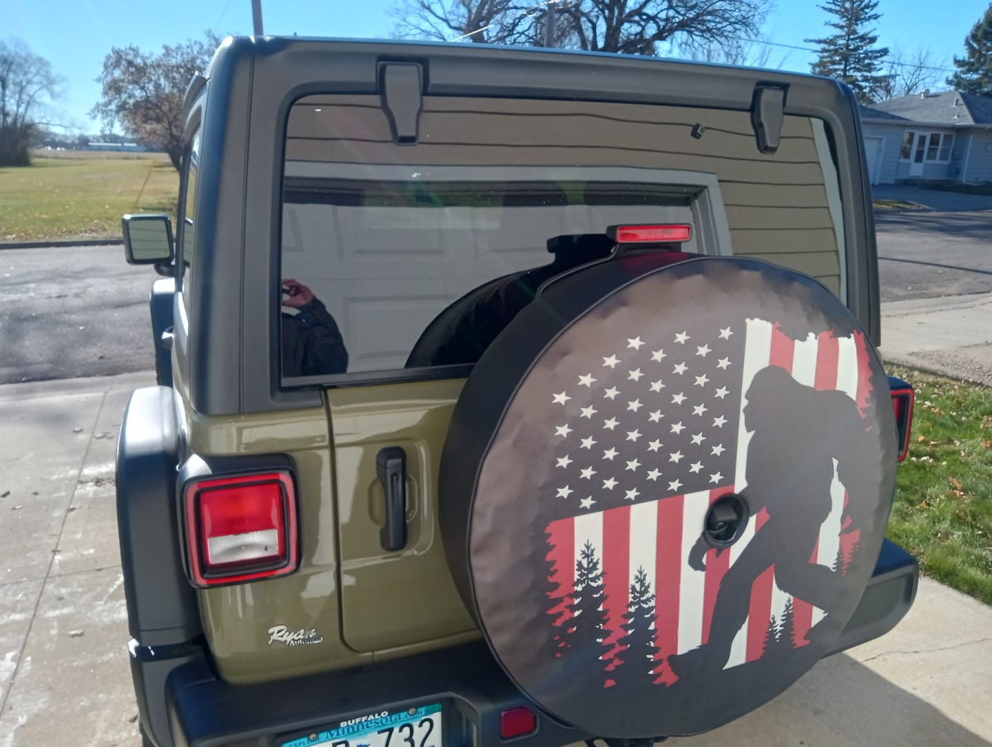 Customer photo review of Bigfoot or Sasquatch American Flag Spare Tire Cover for Bronco, Jeep, Camper, RV, & More