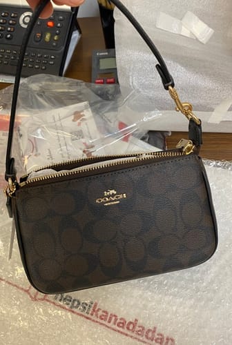 Customer photo review of Coach Women's Nolita 19 In Signature Canvas Gold/Brown Black