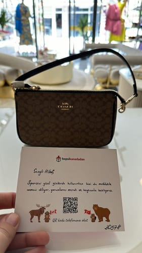 Customer photo review of Coach Women's Nolita 19 In Colorblock Signature Canvas Gold/Khaki/Black
