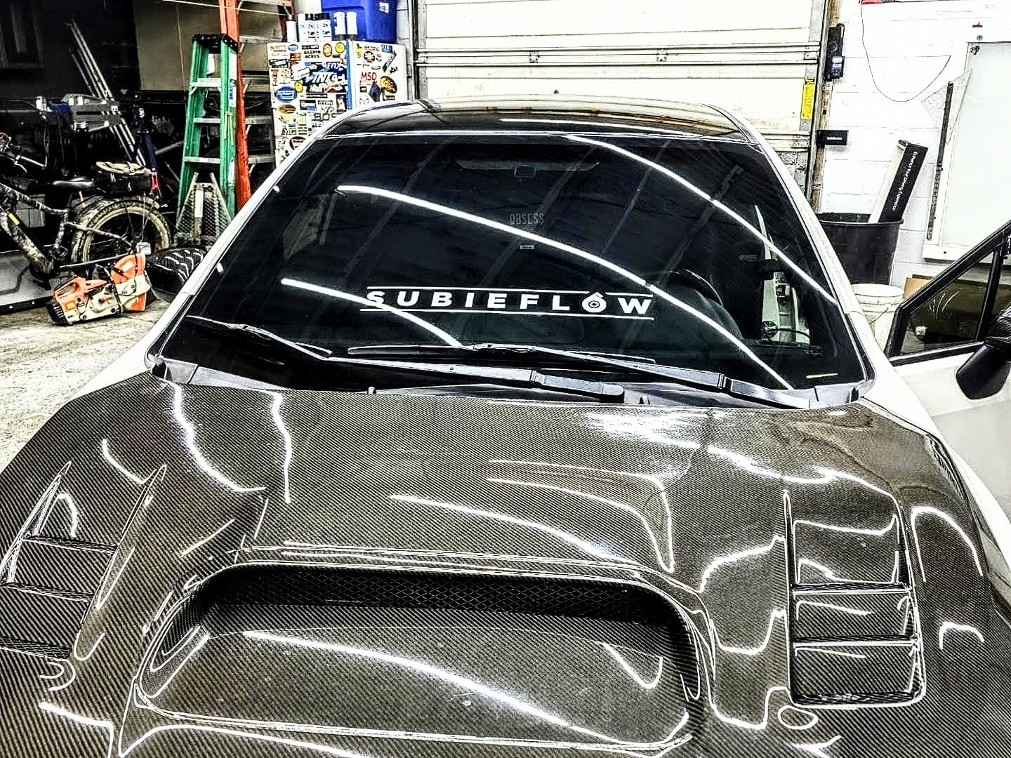 Customer photo review of SubieFlow Windshield Banners