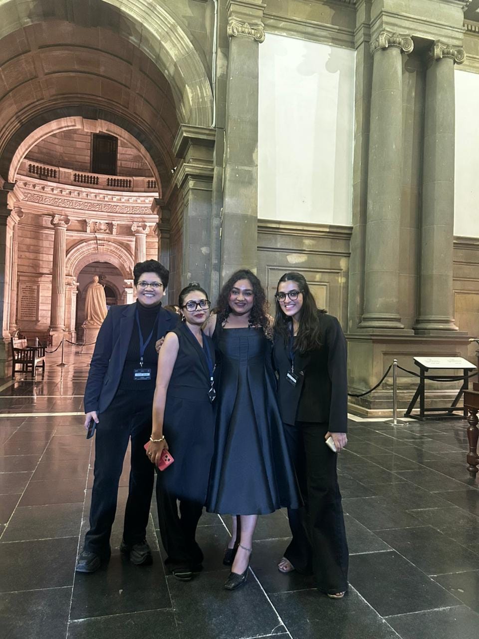 Customer photo review of Rigata Holiday Statement Maxi Dress in Black