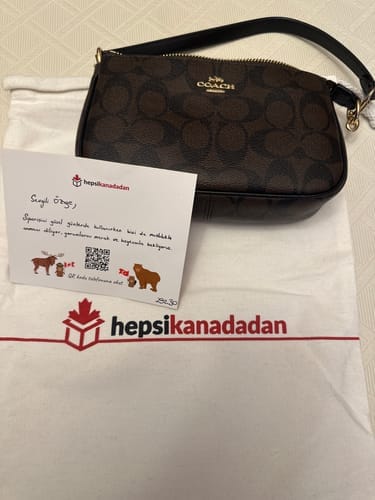 Customer photo review of Coach Women's Nolita 19 In Signature Canvas Gold/Brown Black