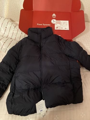 Customer photo review of Uniqlo Women's Ultra Light Down Short Puffer Jacket Navy