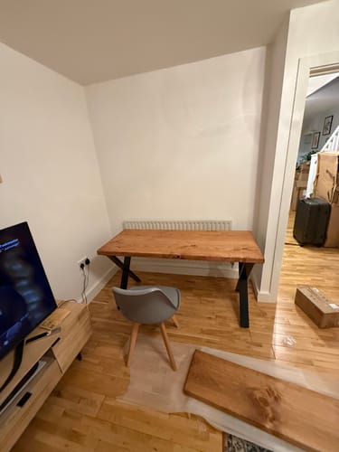 Customer photo review of Industrial Dining Table with X-Frame Leg