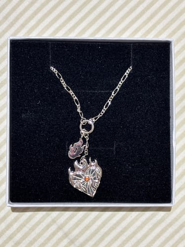 Customer photo review of Flame Hashira Necklace