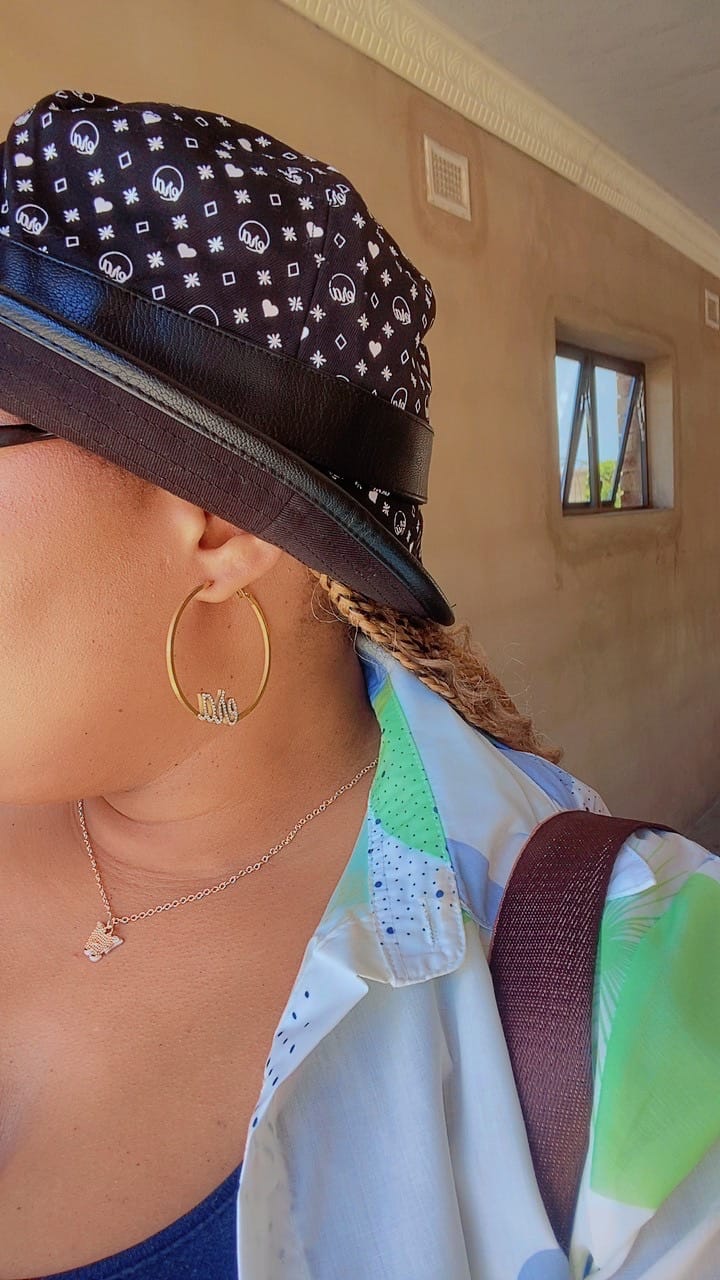 Customer photo review of Gold Precious Era Logo Hoops