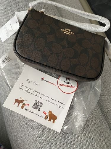 Customer photo review of Coach Women's Nolita 19 In Signature Canvas Gold/Brown Black