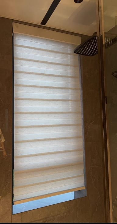 Customer photo review of Bringnox Motorized Zebra Roller Blinds 70% Blackout Linen