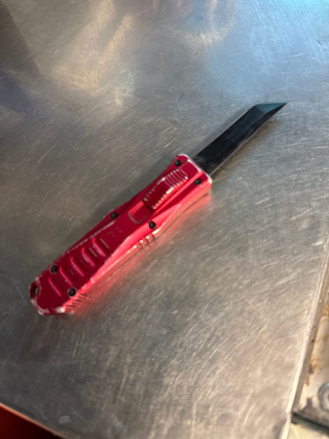 Customer photo review of Black Reaper OTF Knife