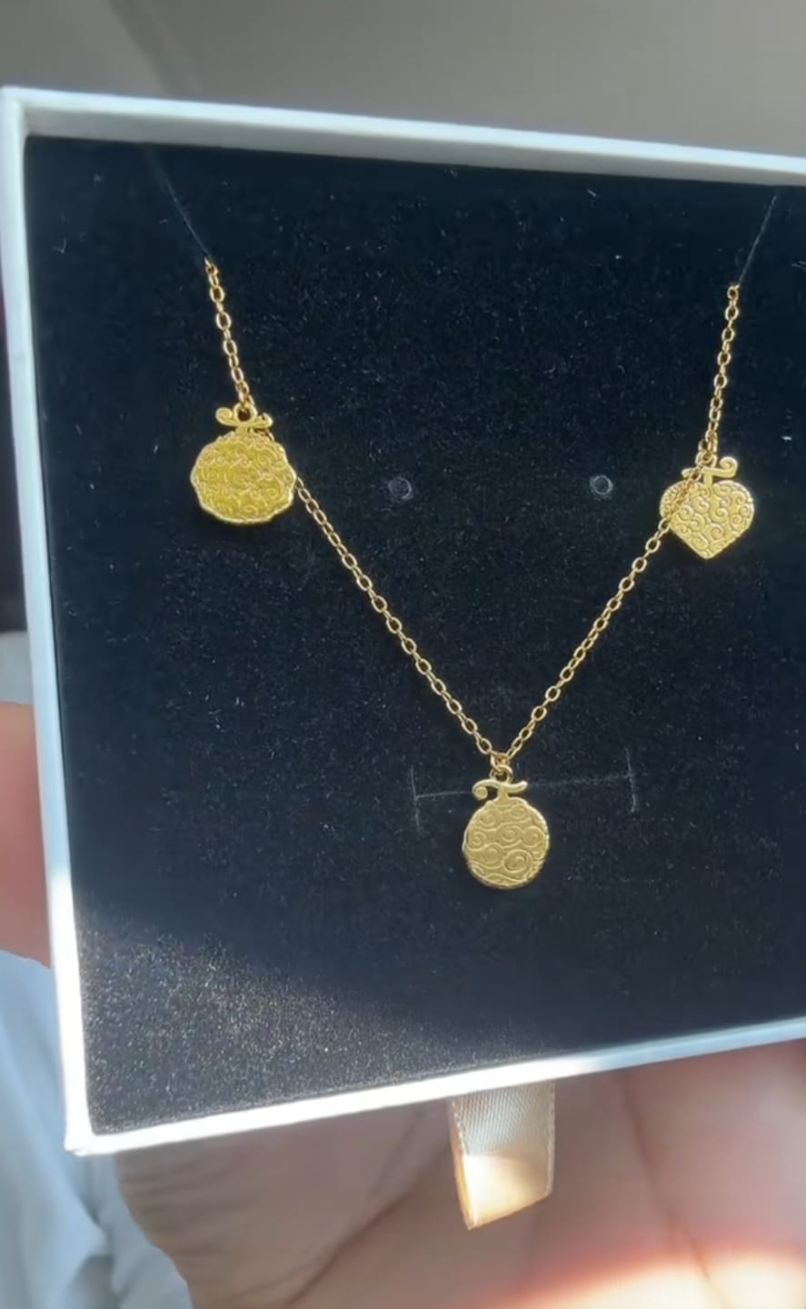 Customer photo review of Devil Fruit Necklace