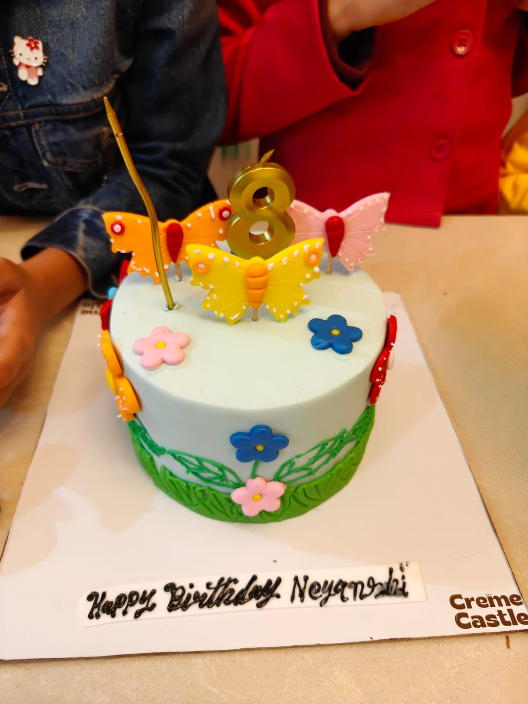 Customer photo review of Flowers and Butterflies cake