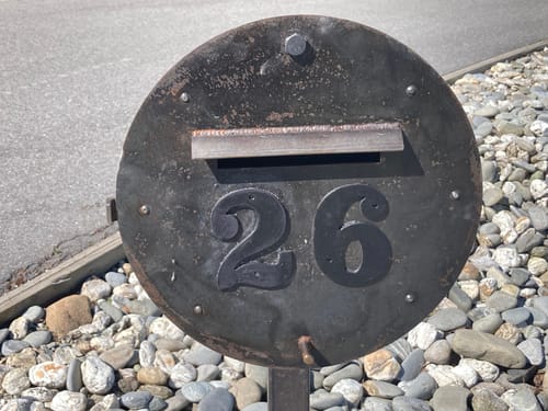 Customer photo review of Thick Black Steel Letterbox with 100mm Street Numbers