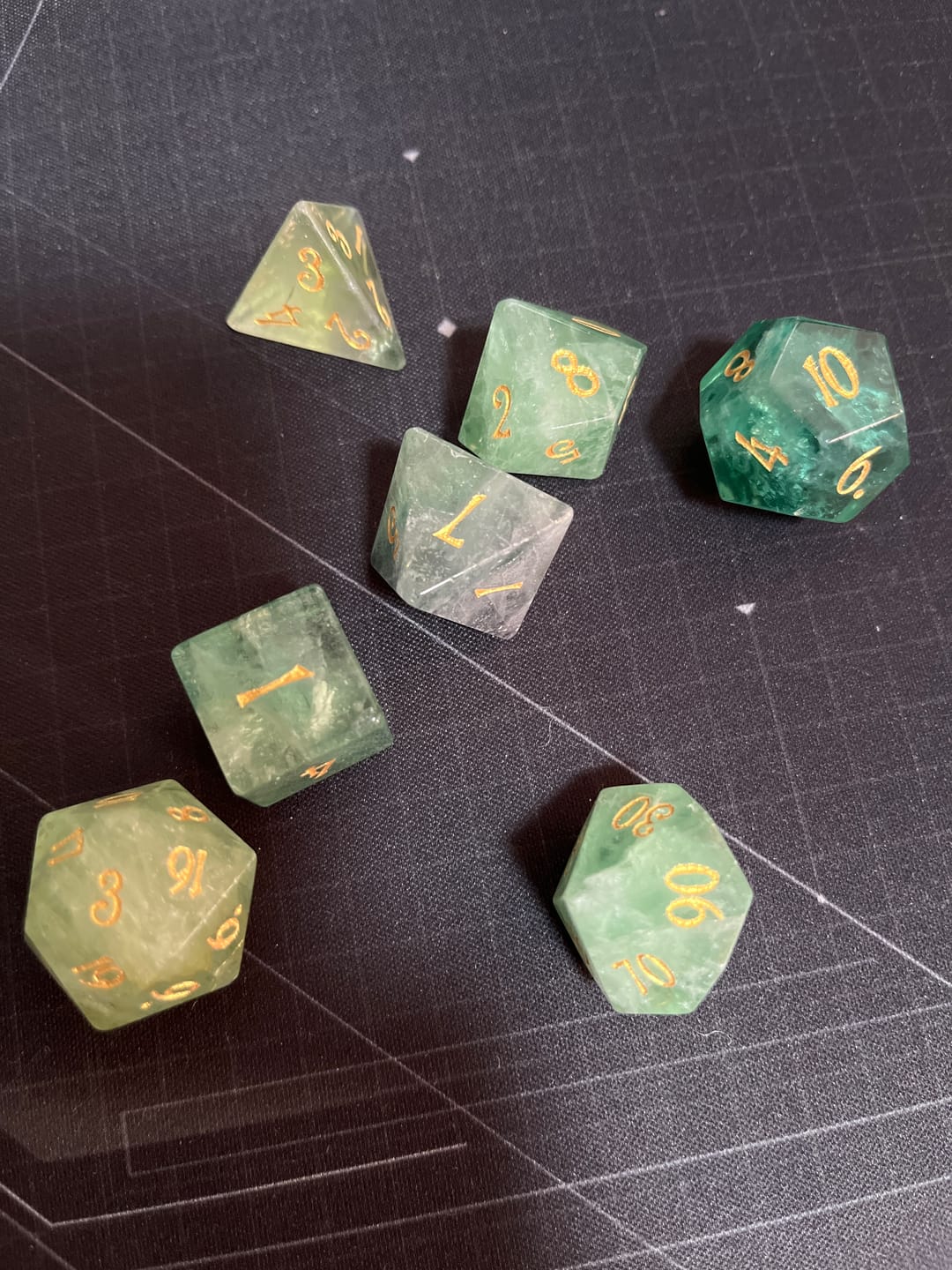 Customer photo review of URWizards D&D Green Fluorite Gemstone Engraved Dice Set Moon Style
