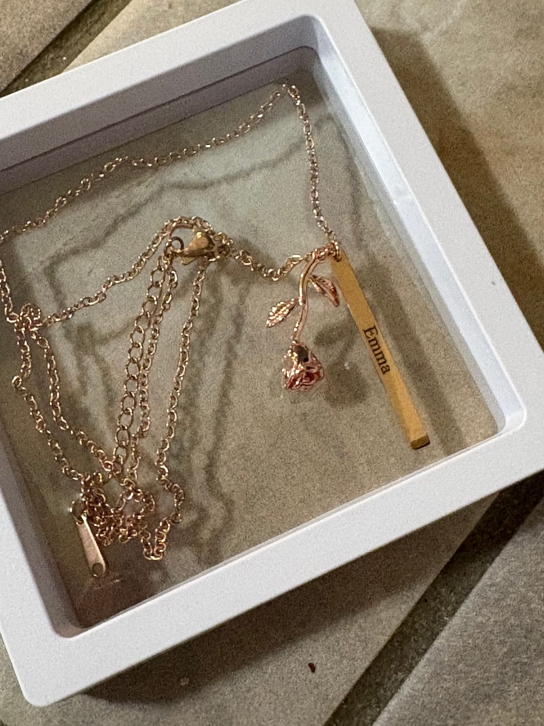 Customer photo review of Engraved Rose Bar Necklace