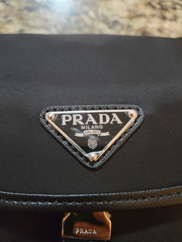 Customer photo review of PHONE BAG 19 IN BLACK RE-NYLON AND SAFFIANO LEATHER TRIM