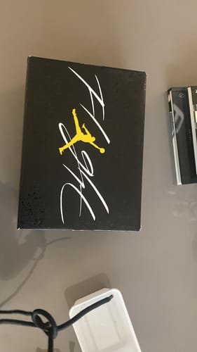 Customer photo review of Nike Air Jordan 4 Retro Thunder