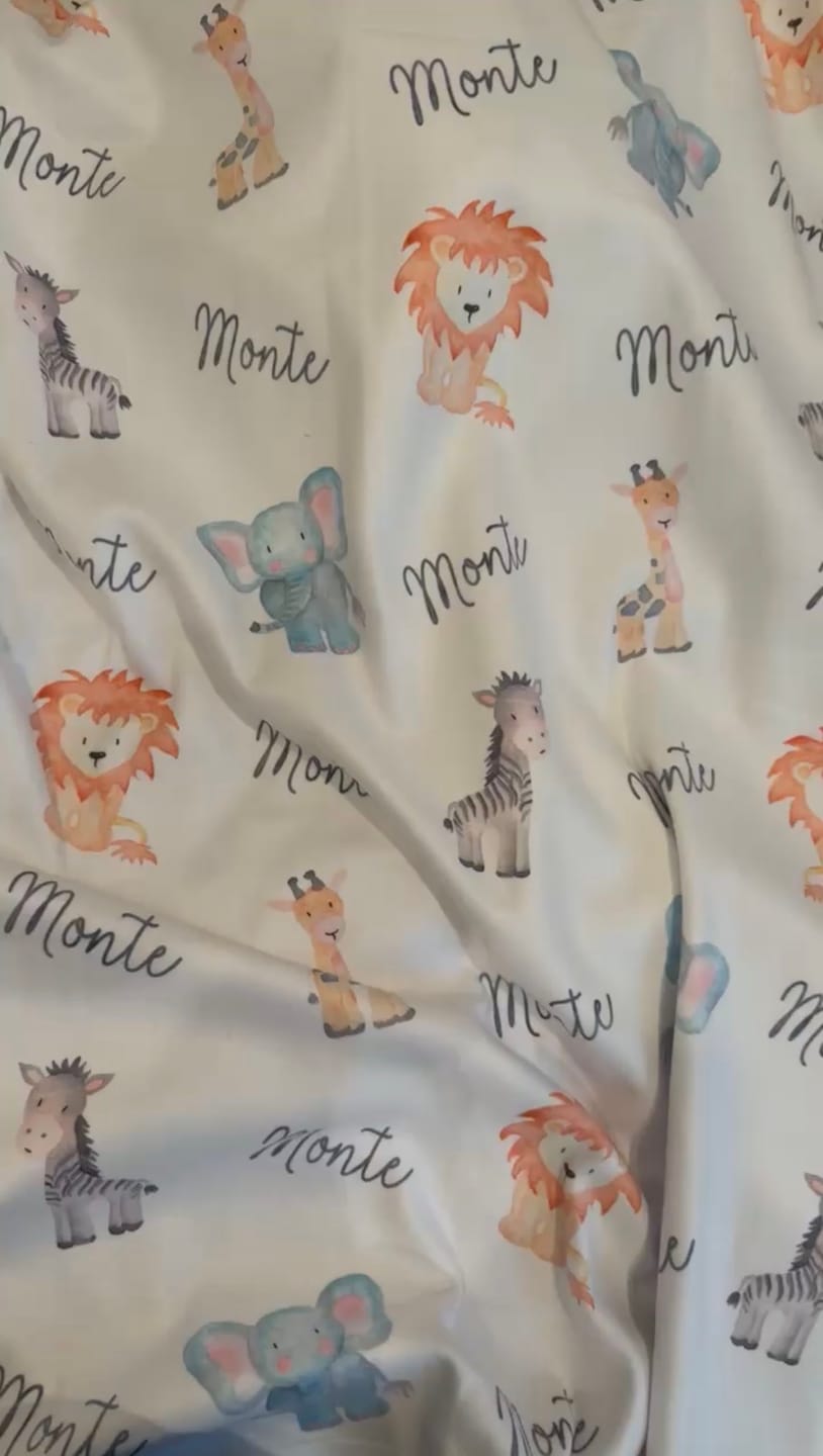 Customer photo review of Personalized Safari Animals Baby Name Blanket