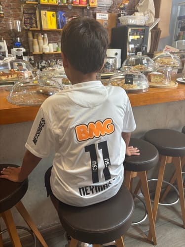 Customer photo review of Camiseta y Pantalon Corto Niño Santos Home 11/12