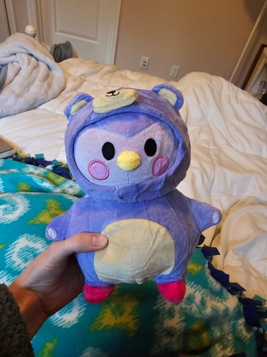 Customer photo review of Purple Mini Plushie: Small but Mighty in Care
