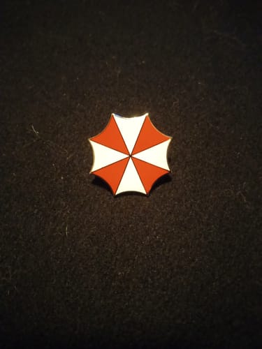 Customer photo review of Resident Evil Umbrella Lapel Pin Movie Props