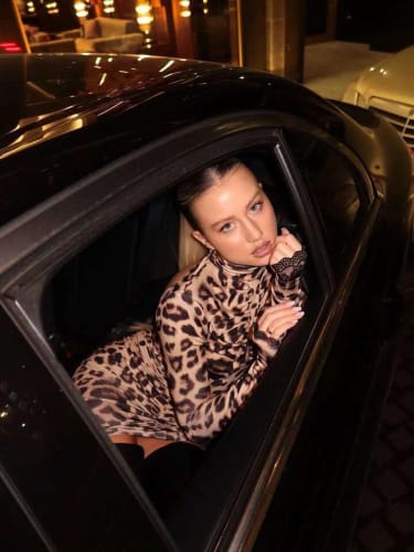 Customer photo review of Mozision Turtleneck Long Sleeve Sexy Mini Dress Women Elegant Leopard Print Backless High Waist Bodycon Club Party Dresses