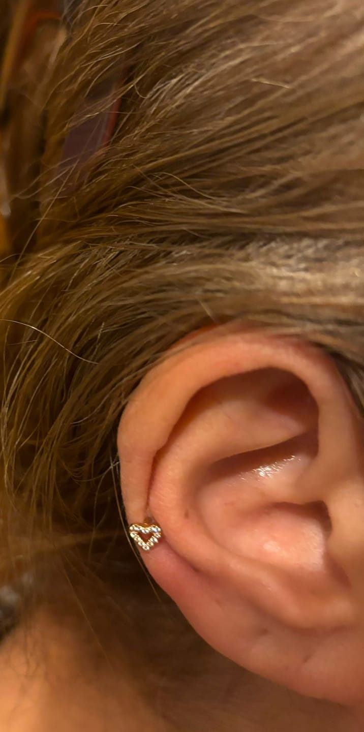 Customer photo review of Heart Piercing | Titan