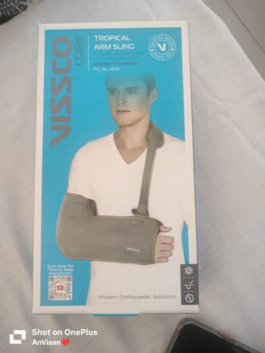 Customer photo review of Tropical Arm Sling  | Provides Mild  Support & Stability to the Shoulder in Resting Position to Promote Healing - Grey Color