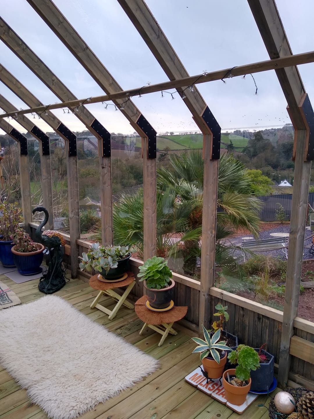 Customer photo review of Emilia L (3x4.8m | 13.8m2 | 18mm) Premium Glasshouse (Painted Grey or Pressure Treated)
