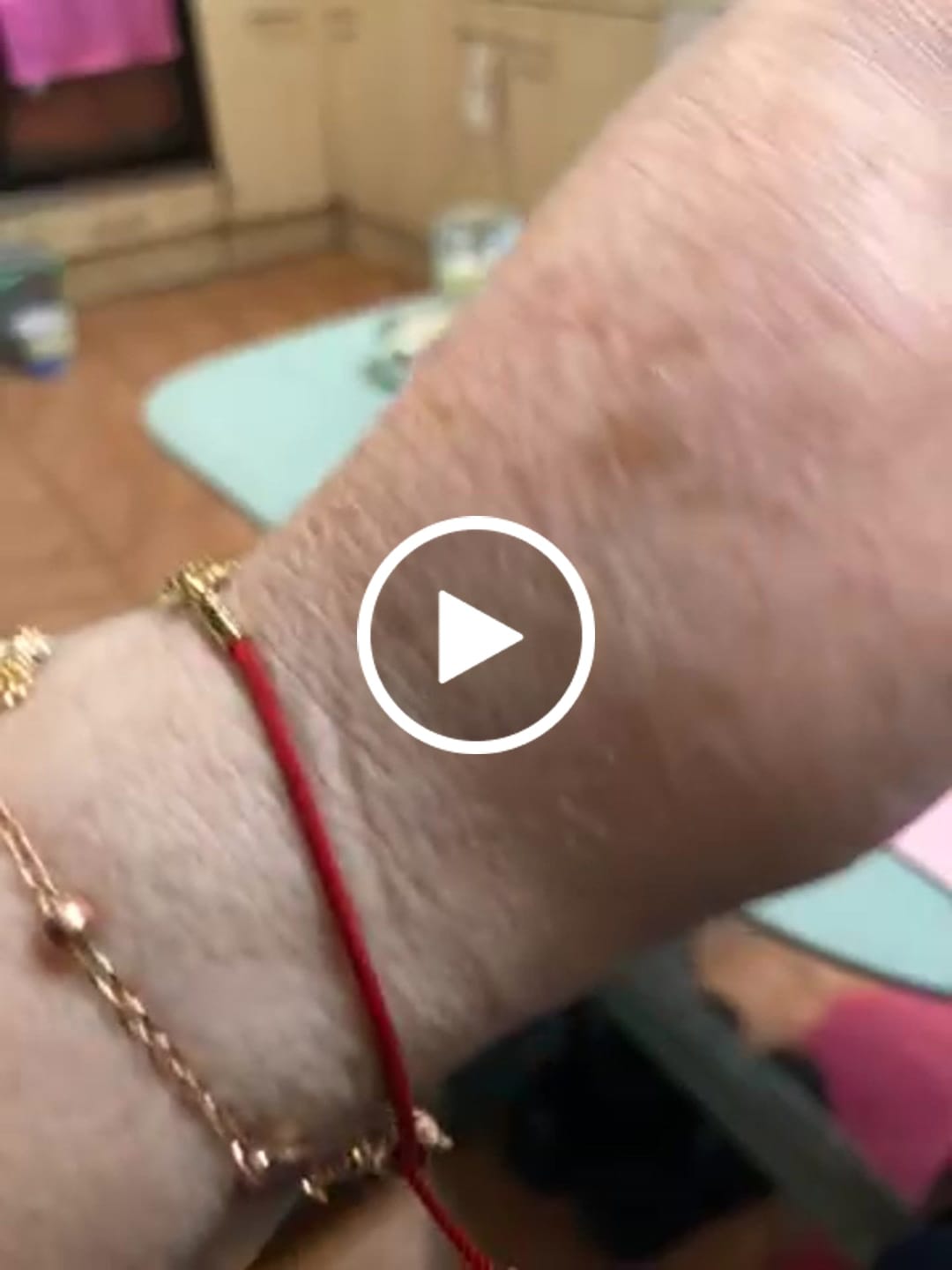 Customer video review of Buddha Stones 18K Gold Plated Hetian Jade Peace Buckle Fu Character Luck Red Rope Bracelet