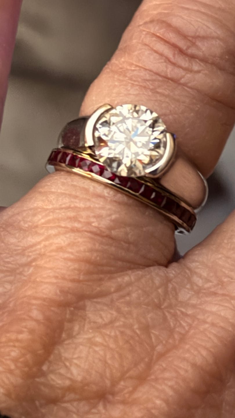 Customer photo review of Solitaire Moissanite Half Bezel Set Sterling Silver Engagement Ring