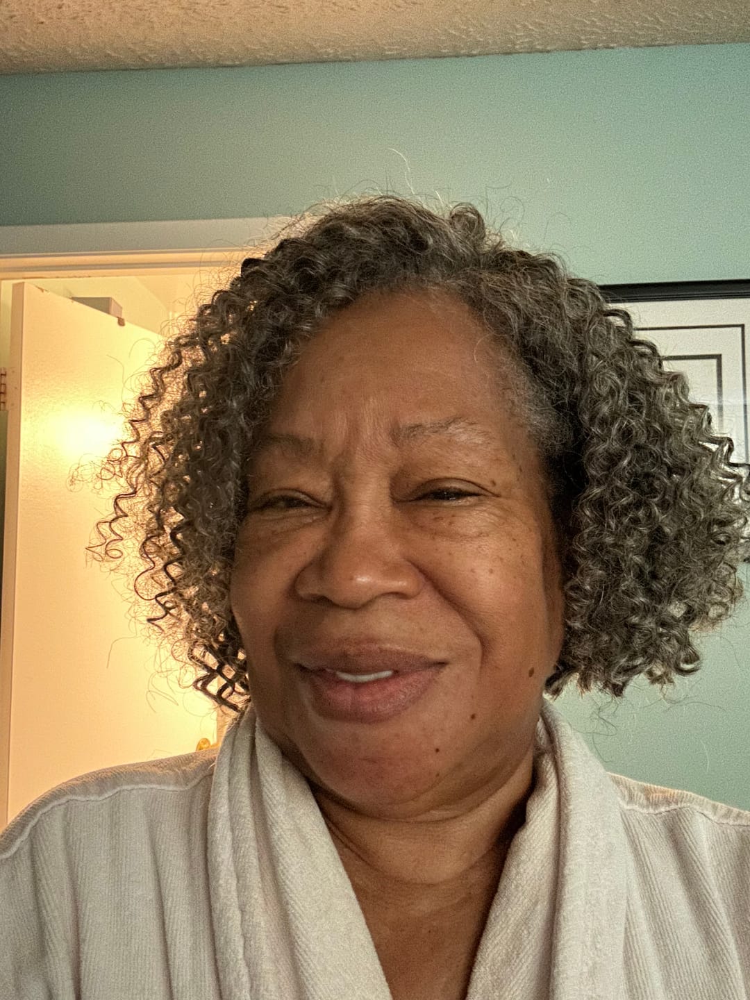 Customer photo review of Luvwin 5x5 Lace Salt And Pepper Short Spiral Curl Wig