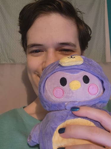 Customer photo review of Purple Mini Plushie: Small but Mighty in Care