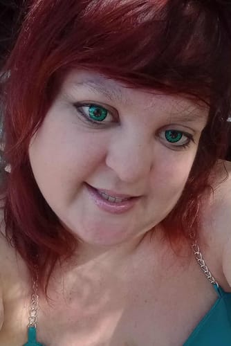 Customer photo review of Cosplay Lucifer's Eye Green Prescription Colored Contact Lenses