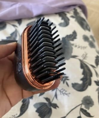 Customer photo review of Mini alisador portatil