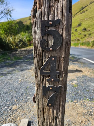 Customer photo review of 100mm Corten Steel House Numbers, Letters & Symbols for Street and Letterboxes