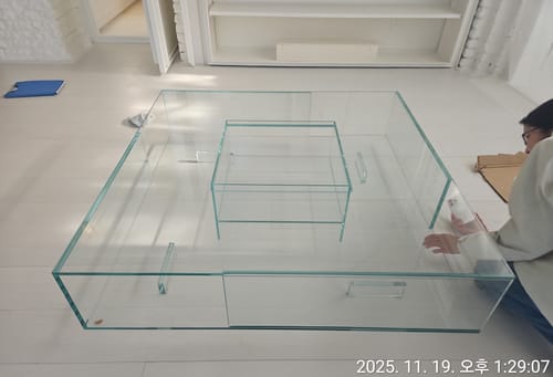 Close view of the SEASONS glass construction and central basin.